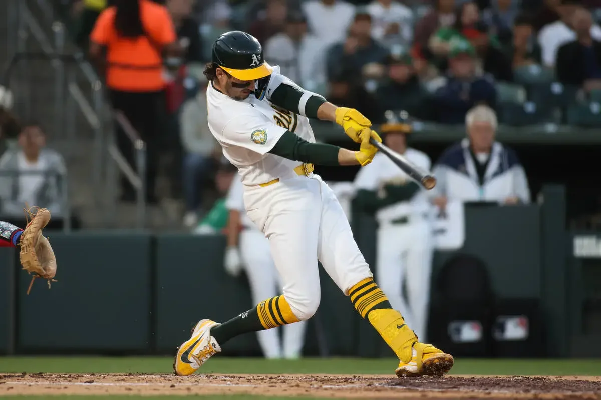 Athletics Edge Out Rangers 2-1 in Thrilling Matchup
